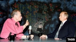 Russian President Vladimir Putin (right) is interviewed by Larry King in New York in September 2000.