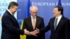 EU President Herman Van Rompuy (center) and European Commission President Jose Manuel Barroso (right) welcome Ukrainian President Viktor Yanukovych ahead of an EU-Ukraine Summit in Brussels earlier this year. 