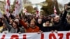 Protesters march to support former President Mikheil Saakashvili in Tbilisi on December 6.