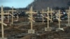 Crosses marked only with numbers stand on the graves of unknown pro-Russian separatists at a cemetery in the eastern Ukrainian city of Donetsk in February.