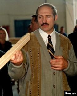 Early interest: President Alyaksandr Lukashenka during a 1999 visit to a wood plant in the town of Vileika.