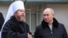 RUSSIA – Russia's President Vladimir Putin (R) and Metropolitan Tikhon (Shevkunov) of Pskov and Porkhov at the Pskovo-Pechersky Dormition Monastery. Pskov region, November 17, 2018