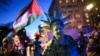 An activist dressed as the Statue of Liberty is pulled in shackles as protesters rally in Washington, D.C. in support of Palestinians during Israeli Prime Minister Benjamin Netanyahu's visit to the U.S capital on February 4.