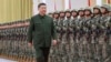 Chinese leader Xi Jinping reviews troops during his inspection of the Chinese People's Liberation Army (PLA) garrison stationed in the Macao Special Administrative Region on December 20.