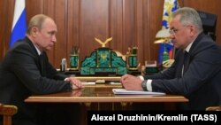 Russian President Vladimir Putin (left) and Defense Minister Sergei Shoigu met in the Kremlin on July 2. 