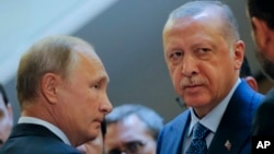 Russian President Vladimir Putin and Turkish President Recep Tayyip Erdogan before talks in Sochi, Russia, in September 2018.