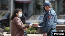 A police officer enforcing a coronavirus lockdown in Yerevan, Armenia.