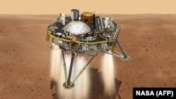 NASA-ның InSight аппаратының Марсқа қонғалы сәтіндегі бейнесі.