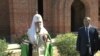 A screen grab of Russia's Orthodox Patriarch Kirill blessing the cornerstone of a new church outside the academy of the Federal Security Service on August 1.