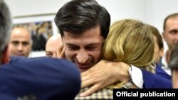 Kakha Kaladze celebrates after exit polls gave him the victory in the Tbilisi mayor's race.