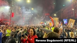 Students arrive in Belgrade on foot on the eve of a major protest on March 14.