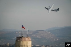 A Russian aircraft takes off at the Khmeimim air base in December.