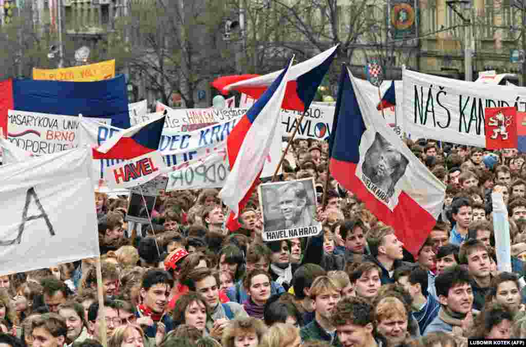 At a protest on Wenceslas Square on December 19, a banner reads &quot;Havel na Hrad&quot; (Havel to the Castle), a popular slogan in support of Havel becoming president. Huge crowds continued to gather after the communists backed down and agreed to free elections. &nbsp;